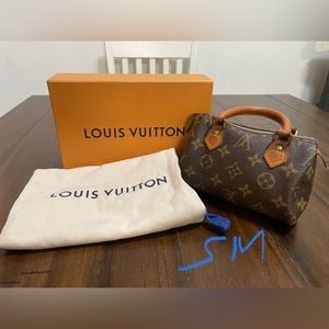 Louis Vuitton Brown Monogram Handbag
